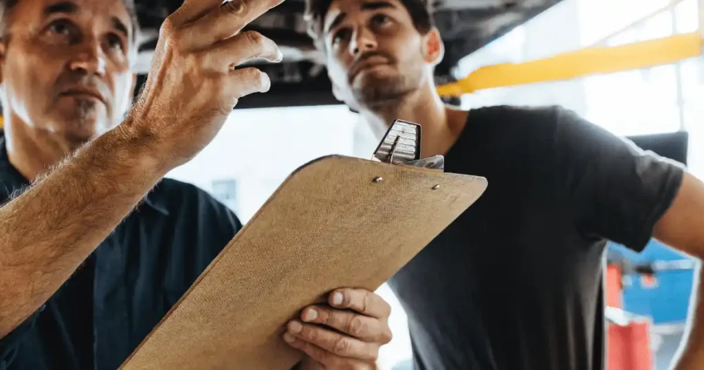 people talking with clipboard